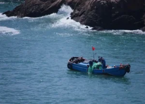 Mannen die aan het het belly boat vissen zijn in Canada.